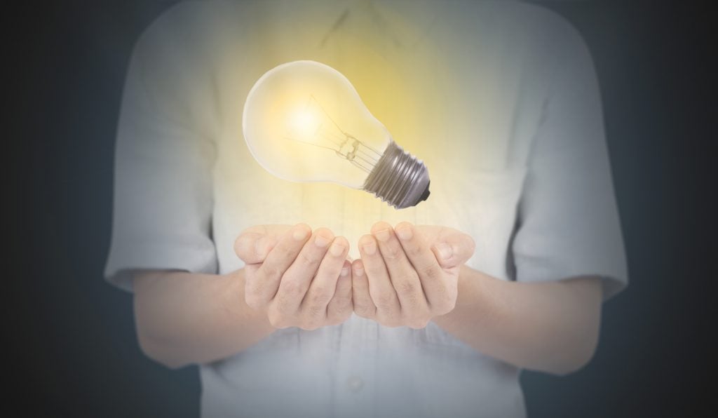 Man holding lightbulb