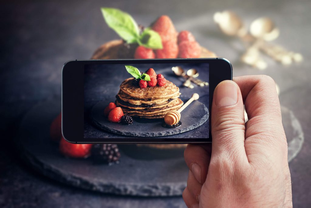 Man taking clear picture with smartphone