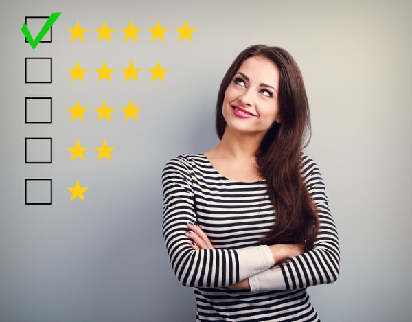 Woman looking at star ratings