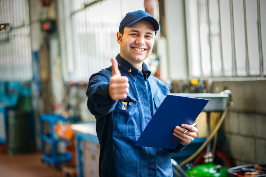 auto service worker giving thumbs up